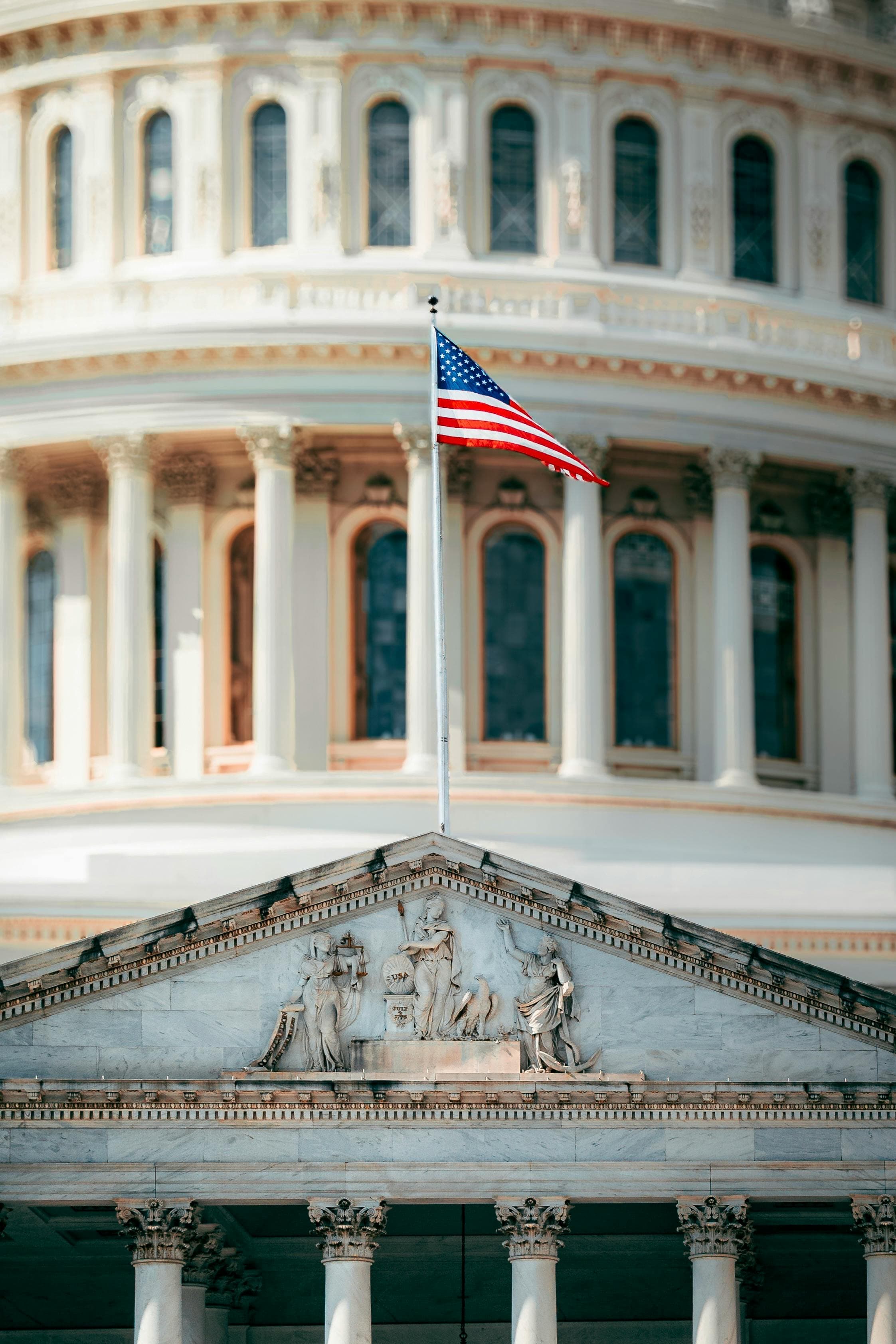 United States Capitol with an American flag